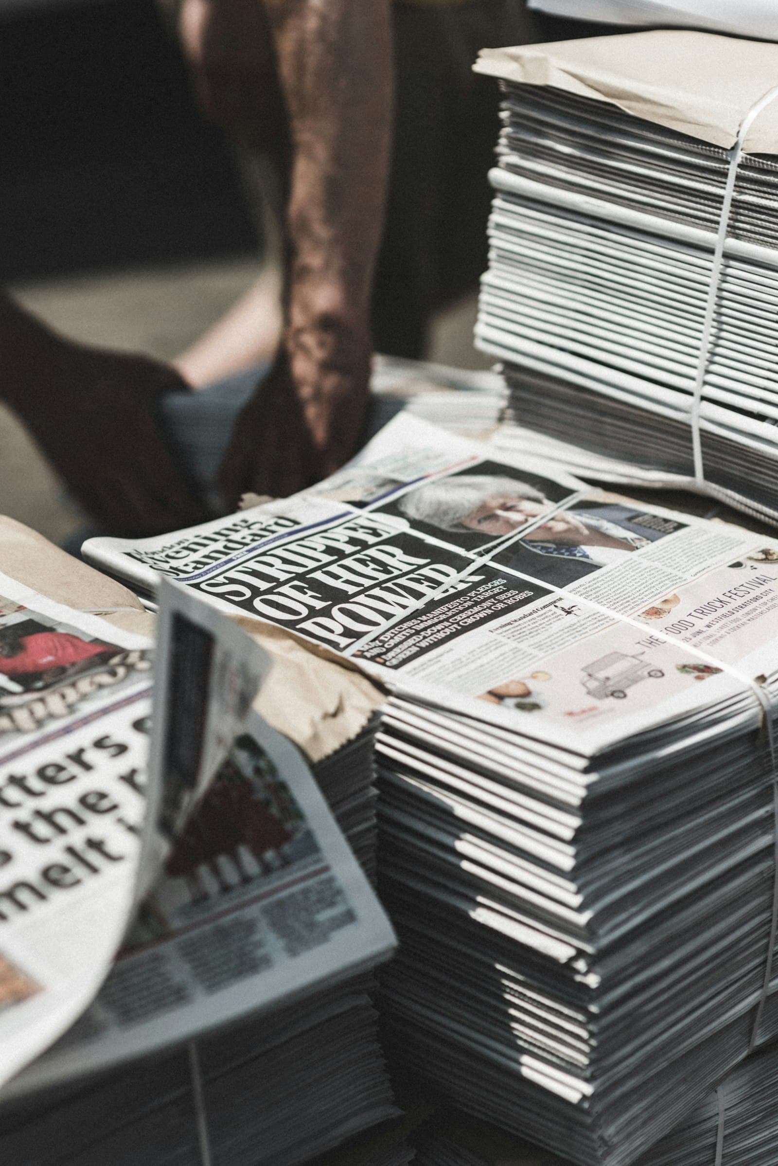 Bundled stacks of newspapers waiting to be distributed